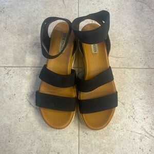 Steve Madden platform sandals.